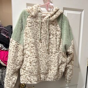 Hem and thread leopard and green Sherpa hooded pullover
